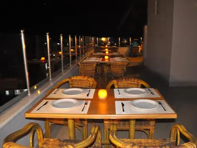 a row of tables and chairs on a balcony at Divani Ali Hotel in Istanbul