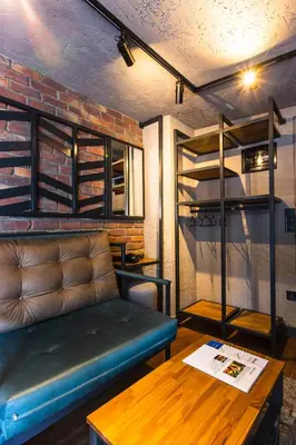 a living room with a couch and a table at Mansion Gorki in Istanbul