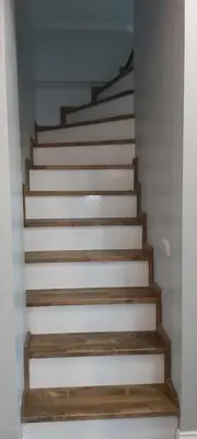 a stairway with wooden steps in a room at GANİGAR alibeyköy in Istanbul