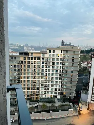 a large apartment building with a view of a city at GANİGAR alibeyköy in Istanbul