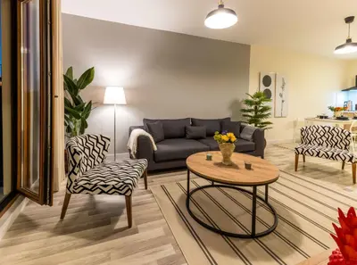 a living room with a couch and a table at Monnas Suite in Istanbul