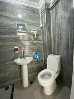 a bathroom with a toilet and a sink at Retro Suites in Istanbul