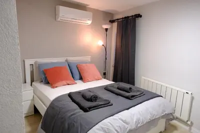 a bedroom with a bed with towels on it at Cactus Suites in Istanbul