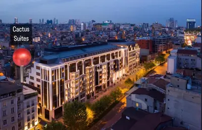 a view of a building in a city at night at Cactus Suites in Istanbul