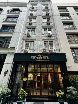 a large building with a star bank job sign on it at Sayeban Gold Hotel in Istanbul