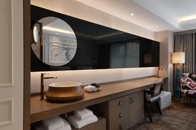 a bathroom with a sink and a mirror at Burdock Hotel Istanbul, Autograph Collection in Istanbul