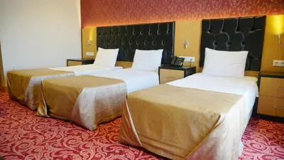 two beds in a hotel room with two at Vois Hotel Atasehir & SPA in Istanbul