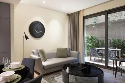 a living room with a couch and a table at Marriott Executive Apartments Istanbul Fulya in Istanbul