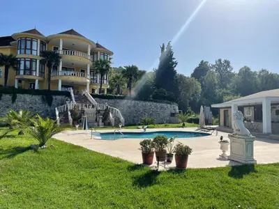 a large house with a swimming pool and a building at Büyükbalkan Mansion, Charming Farmhouse, Altınova Yalova in Altınova