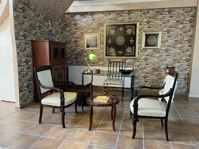 a room with two chairs and a table and a table and two chairs at Büyükbalkan Mansion, Charming Farmhouse, Altınova Yalova in Altınova
