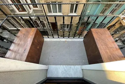 a room with two wooden ramps in a building at Apt w/ Balcony in center,5 mn walk to Istiklal in Istanbul
