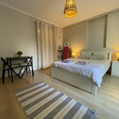 Apt w/ Balcony in center
