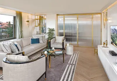 a living room with a couch and a table at Ulus G Residences in Istanbul