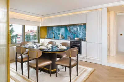 a dining room with a table and chairs at Ulus G Residences in Istanbul
