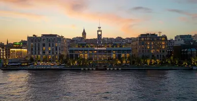 a view of a city with a river and buildings at The Peninsula Istanbul in Istanbul