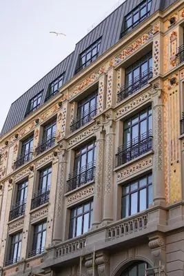 a building with windows and balconies on it at The Peninsula Istanbul in Istanbul