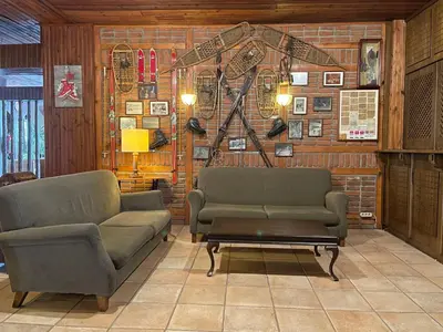 a living room with two couches and a coffee table at Beceren Hotel in Bursa