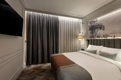 a hotel room with a bed and a window at Livro Hotel in Istanbul