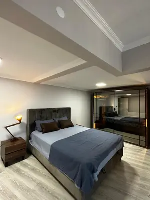 a bedroom with a large bed and a large window at Whole Apartment at The Heart of Sisli Nisantasi K in Istanbul