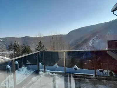 a view of a snow covered mountain from a building at Turkish Mountain Retreat in Saadet