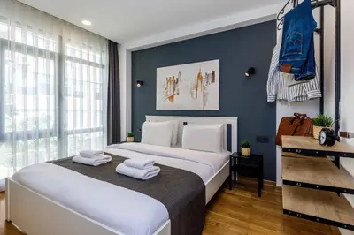 a bedroom with a large bed with towels on it at Monnas Bosphorus in Istanbul