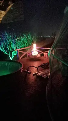 a night view of a building with green lights at Sapanca Green Dome in Sapanca