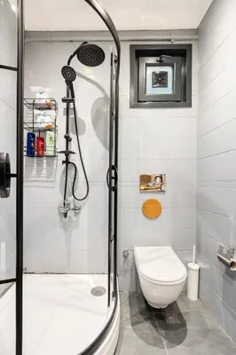 a bathroom with a shower and a toilet at sevim suites Nişantaşı in Istanbul