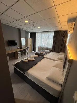 a bedroom with a large bed in a room at ÖZTÜRKS HOTEL in Istanbul