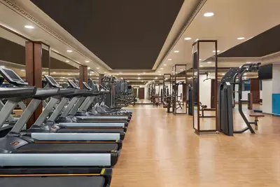 a row of treadmills in a gym at Ramada Plaza by Wyndham Silivri in Silivri