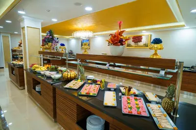 a buffet in a restaurant with many plates of food at Ramada Plaza by Wyndham Silivri in Silivri