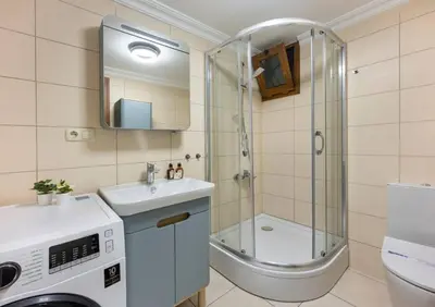 a bathroom with a shower and a sink and a toilet at Lovely bright central modern 1Bed1Bath! #159 in Istanbul
