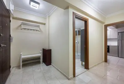 a room with a hallway with a bench and a mirror at Lovely bright central modern 1Bed1Bath! #159 in Istanbul