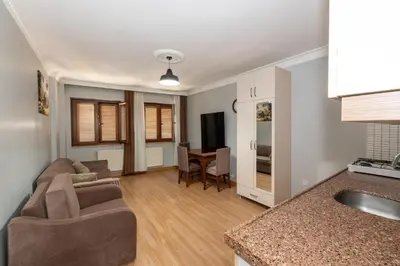 a living room with a couch and a table at Terra Apart Taksim in Istanbul