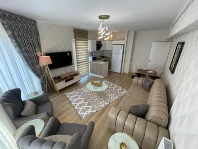 an overhead view of a living room with couches at King Suite ZG5 in Esenyurt