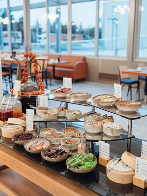 a display of food on a table in a restaurant at Selectum City Ataşehir in Istanbul