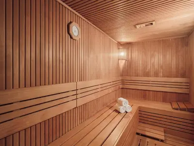 an empty sauna with a clock on the wall at Selectum City Ataşehir in Istanbul