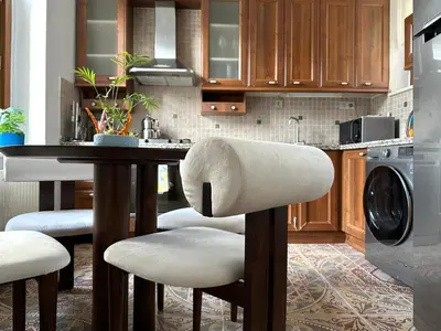 a kitchen with a table with a roll of toilet paper on it at Botter Dream House in Istanbul