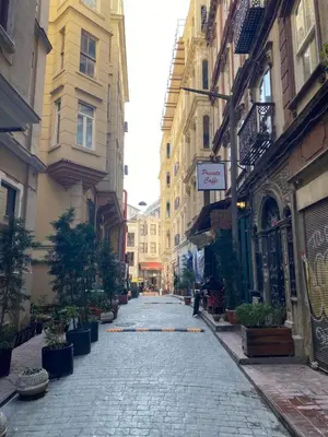 an empty street in a city with buildings at Botter Dream House in Istanbul