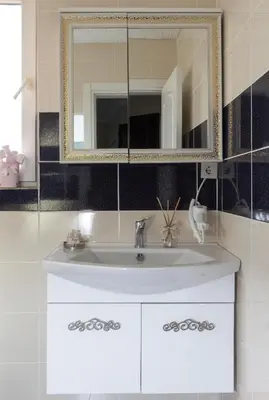 a bathroom with a white sink and a mirror at Carvan hotel in Istanbul