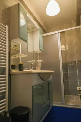 a bathroom with a sink and a shower at TAKSİM PERA House in Istanbul