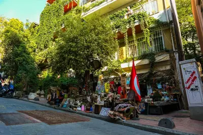 a street with a market with a building at TAKSİM PERA House in Istanbul