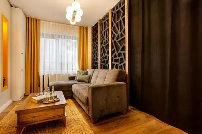 a living room with a couch and a table at Port Galata Suites in Istanbul