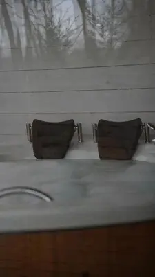 a bathroom sink with two handles on top of it at Pentalow Cabin in Kocaeli
