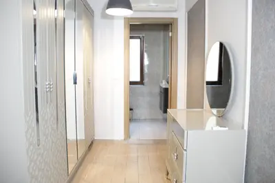 a bathroom with a shower and a sink and a mirror at Solo Suites Hotel in Istanbul
