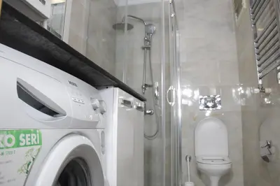 a bathroom with a toilet and a shower at Solo Suites Hotel in Istanbul
