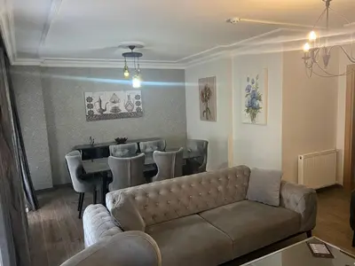 a living room with a couch and a table at Solo Suites Hotel in Istanbul