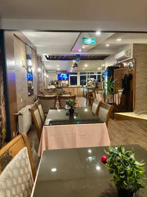 a dining room with tables and chairs in a restaurant at GROSS HOTEL in Istanbul