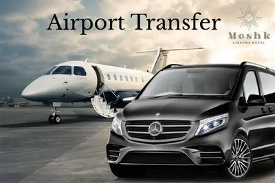 an airport transfer vehicle parked next to an airplane at Meshk Airport Hotel in Arnavutköy
