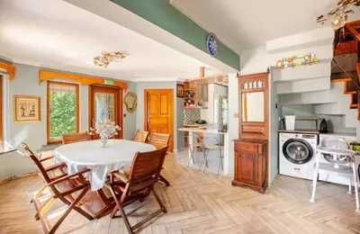 a kitchen and dining room with a table and chairs at Villa Base Kırkpınar Detached Villa with pool in Sapanca