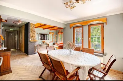 a dining room with a table and chairs at Villa Base Kırkpınar Detached Villa with pool in Sapanca